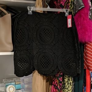 Xhiliration mini lace skirt